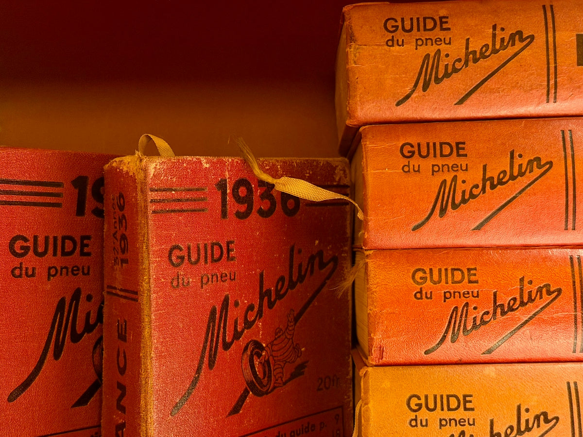 Stack of vintage michelin guide books